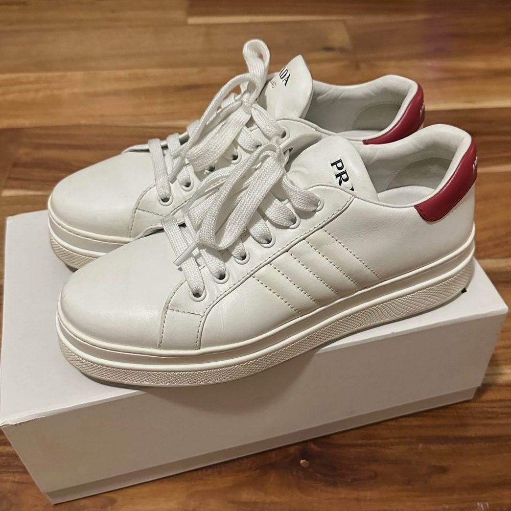 Prada Women’s White Leather Sneakers with Red Heel